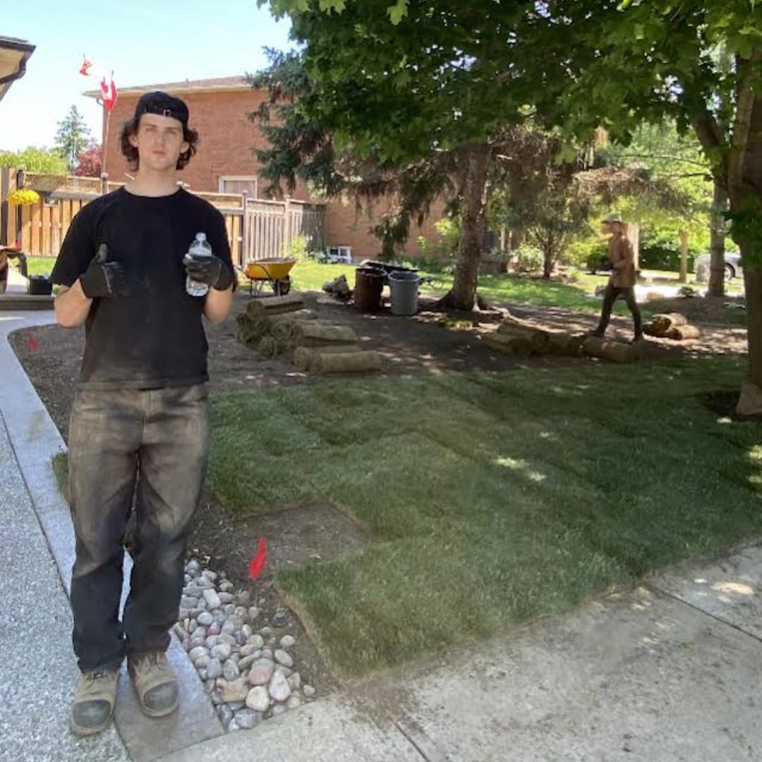 landscaper at a sod installation